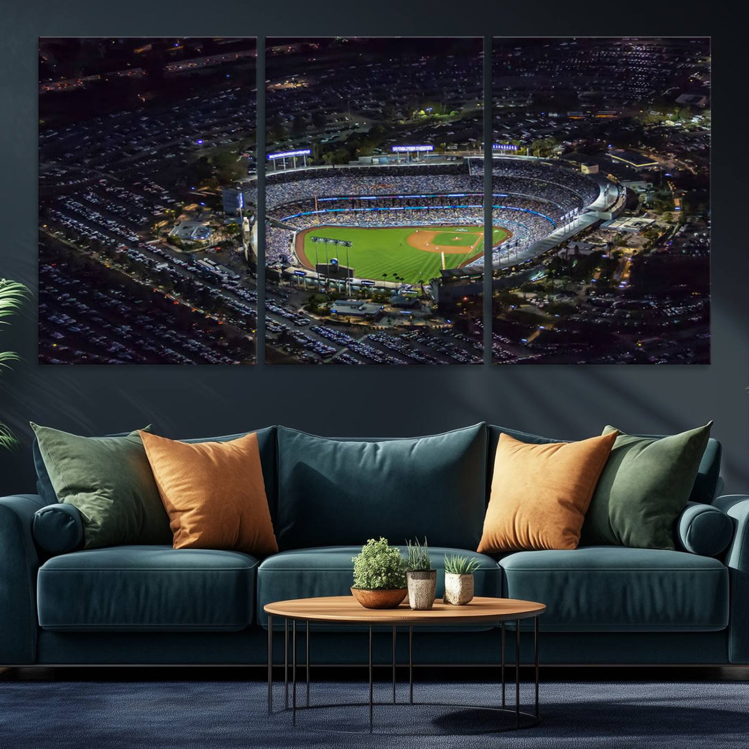 A large Los Angeles Dodgers print of Dodger Stadium at night is displayed near a window.