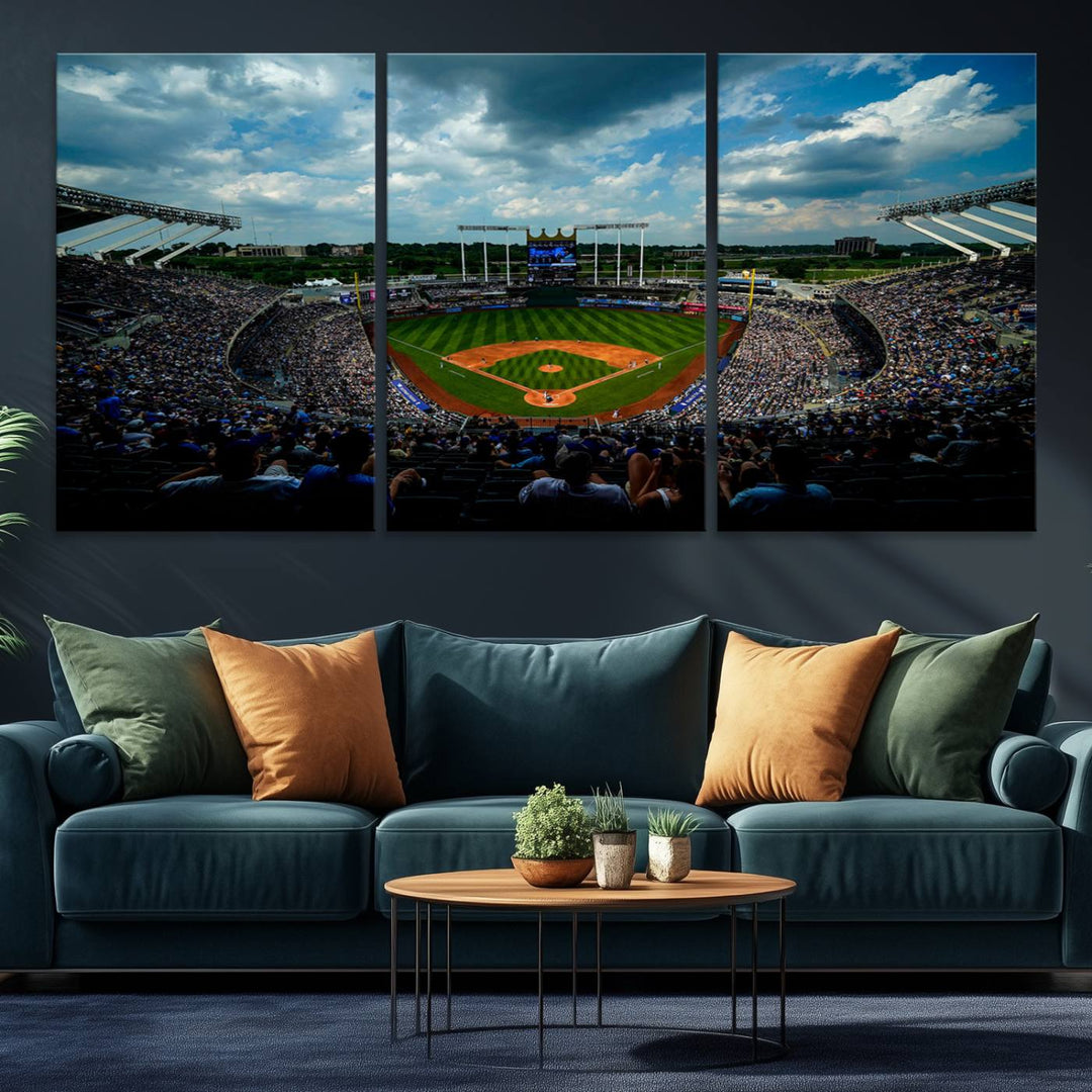 A 3-panel print of Kauffman Stadium, showcasing a crowded baseball field under cloudy skies.