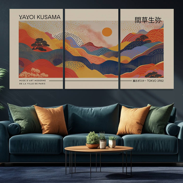 The Yayoi Kusama vibrant landscape canvas print featuring abstract mountains and a sun enhances the space with its modern aesthetic.