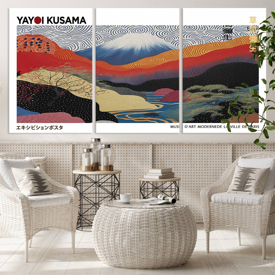 The vibrant abstract landscape canvas print featuring the Framed Yayoi Kusama 1986 Wall Art adds a touch of contemporary décor to the room.