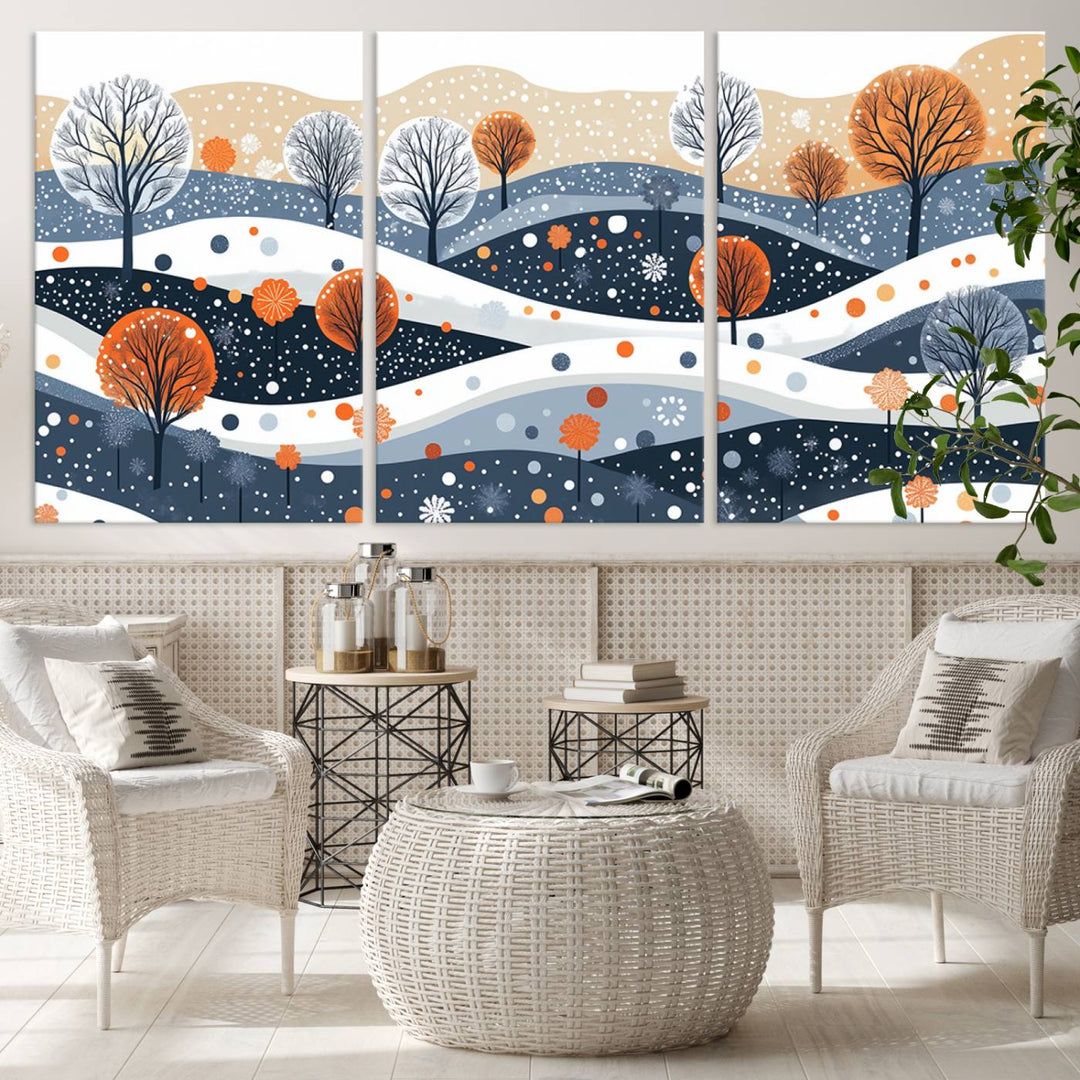 The "Abstract Winter Landscape Canvas Wall Art Print," featuring a triptych of landscapes with trees and hills in vibrant orange, white, and blue hues, adds a gallery-quality finish that transforms the space into an art lover's dream.