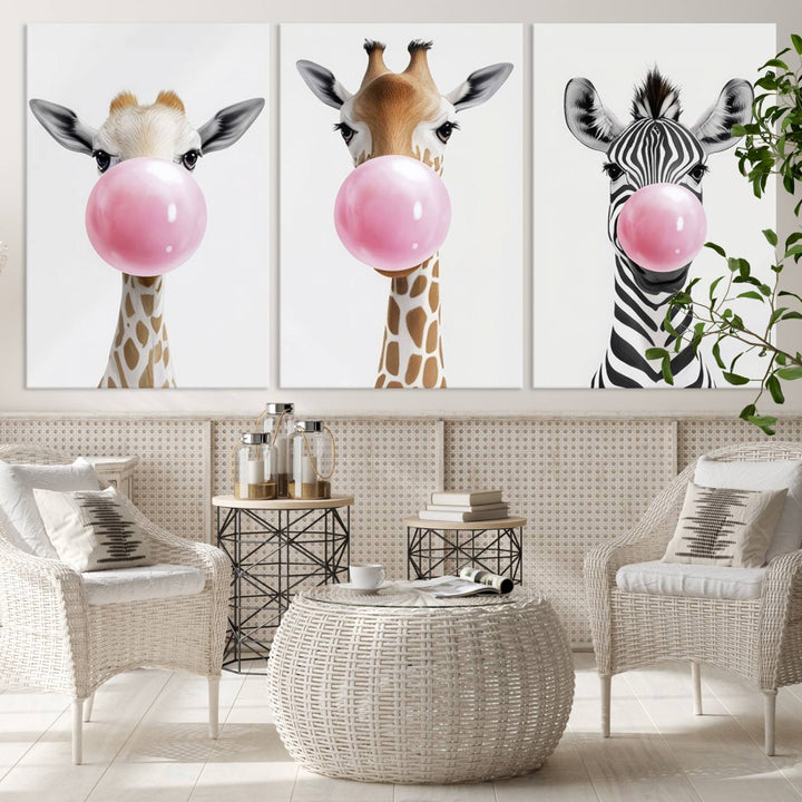 The Bubblegum Animals Canvas Wall Art, featuring a playful trio of giraffe and zebra portraits blowing pink bubblegum, brings charm and whimsy to your space. Ideal for nursery wall art or any fun area, this delightful decor piece is ready to hang and perfect for creating a playful atmosphere.