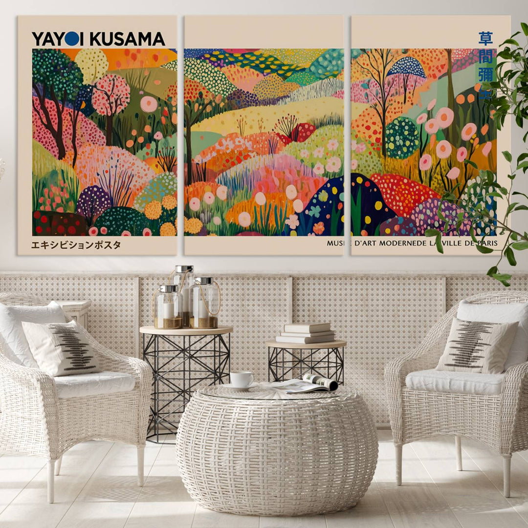 A framed Yayoi Kusama Wall Art Canvas Print features a vibrant abstract landscape adorned with flowers.