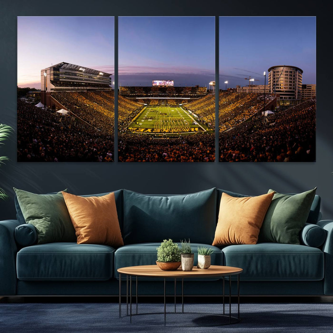 The Iowa Hawkeyes Kinnick Stadium Wall Art Canvas Print captures a sunset scene, making it perfect for display on a wall.