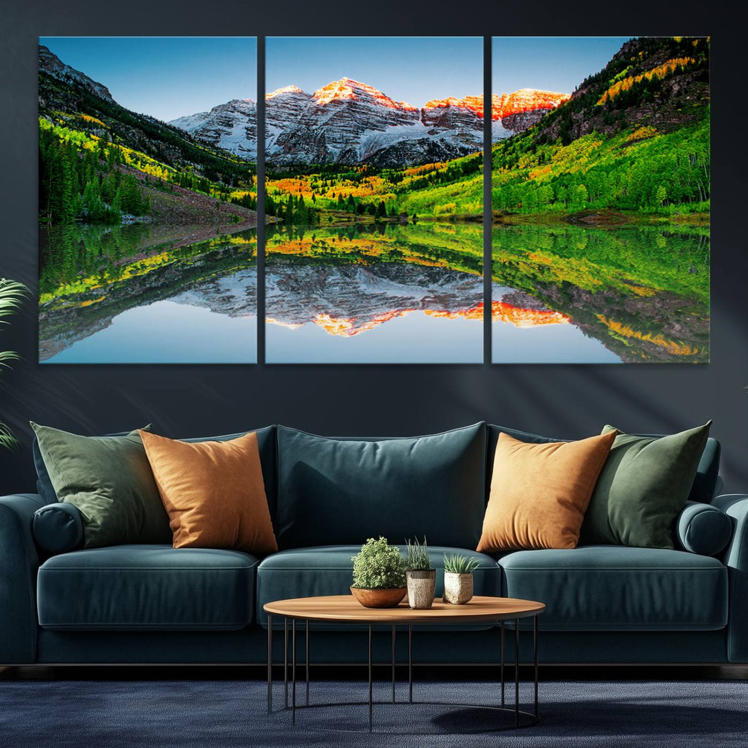 The Sunrise Maroon Bells Lake Wall Art Print beautifully captures North Maroon Peak mirrored in the tranquil lake, framed by lush greenery.