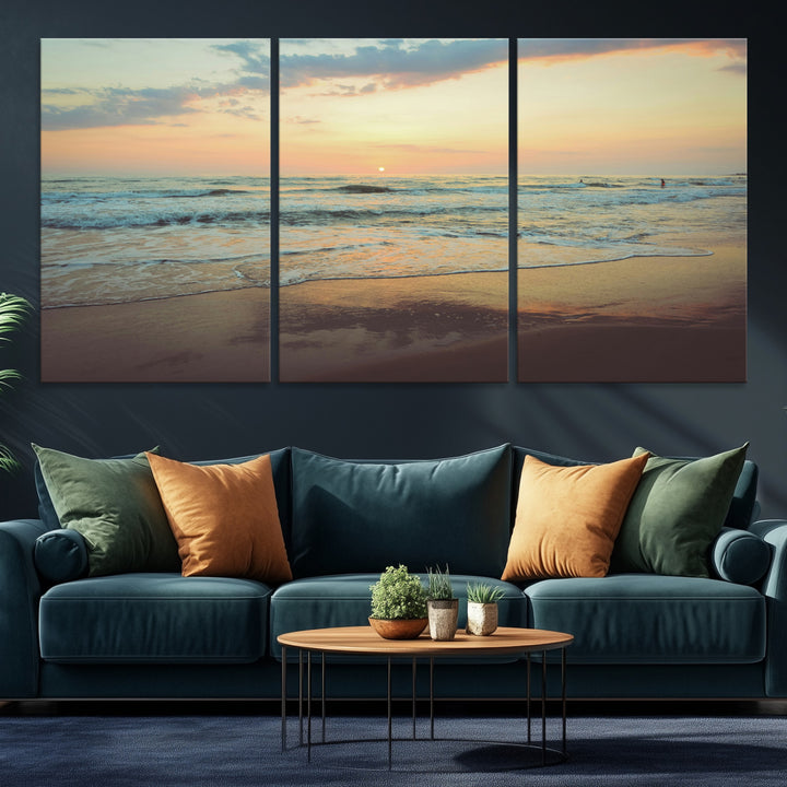 Warm sunset over gentle ocean waves with pastel sky and reflections on wet sand, creating a calm and soothing beach ambiance.