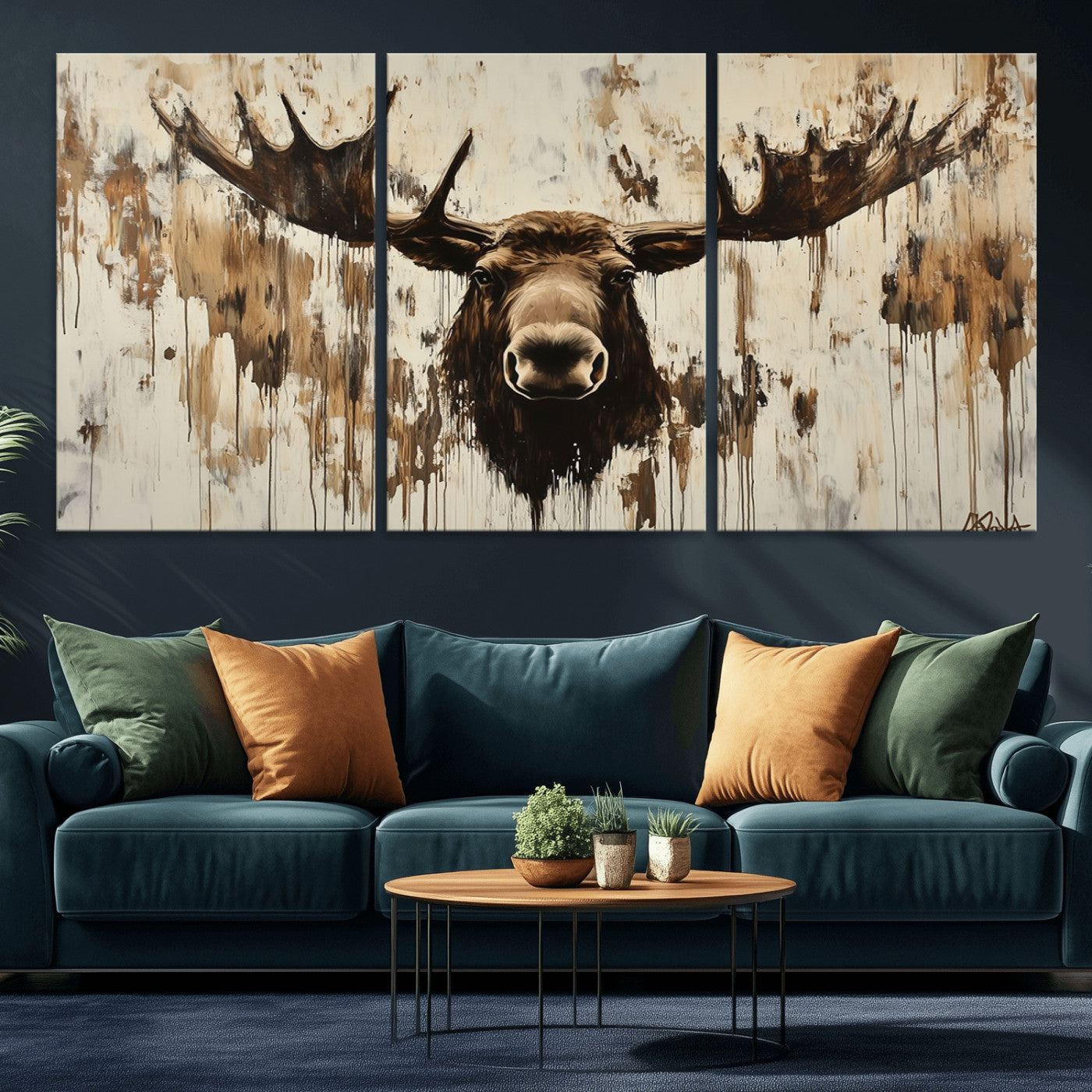 Expressive painting of a moose head with wide antlers in dark brown and beige tones, featuring paint drips and splatters on a light textured background, creating a striking rustic wall art canvas.