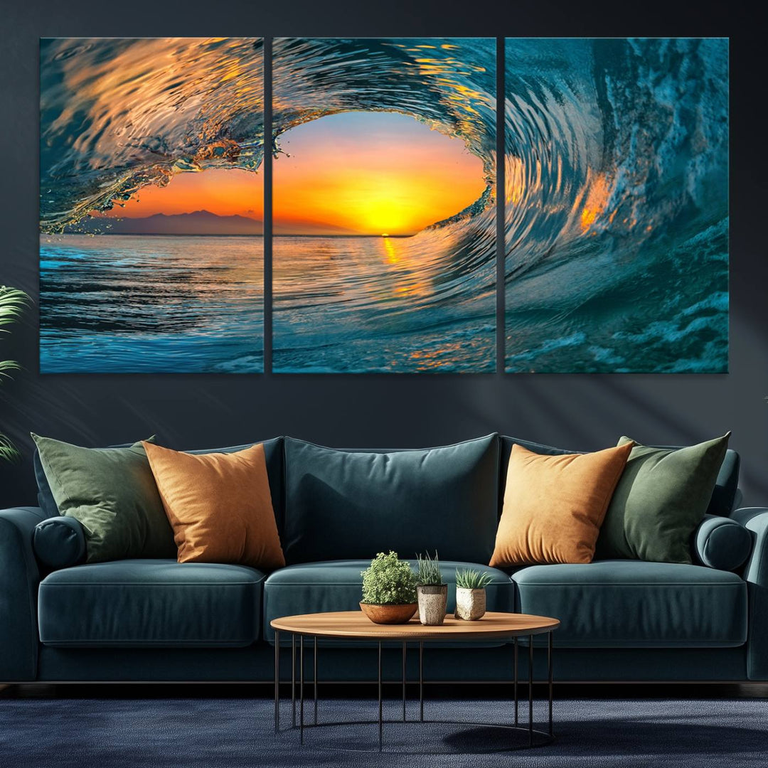 The Ocean Wave Sunset Wall Art canvas print features a vibrant ocean wave at sunset, forming a tunnel with silhouetted mountains.