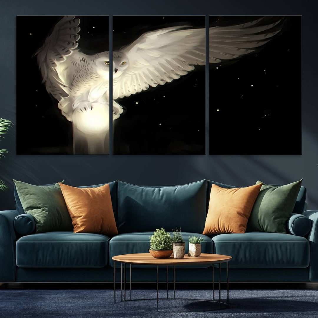 The Night Owl Art graces the wall with its depiction of a snowy owl on a glowing orb, perfect for modern decor.