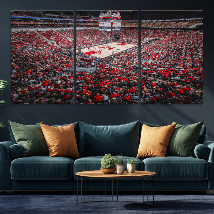 A painting of Louisville Cardinals fans in red at the KFC Yum Center Arena.