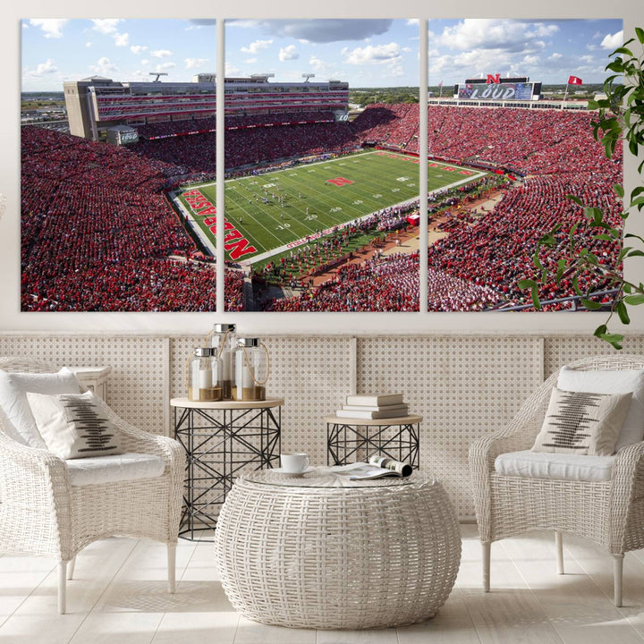 The University of Nebraska Cornhuskers Football Team Print showcases a vibrant triptych of Lincoln Memorial Stadium, depicting a packed football stadium filled with energetic fans. This handmade art piece is crafted in the USA and printed on premium canvas for a gallery-quality finish.