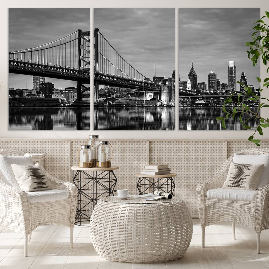 The "Large Wall Art Philadelphia Canvas Print" showcases a black-and-white depiction of the Ben Franklin Bridge with a water reflection.