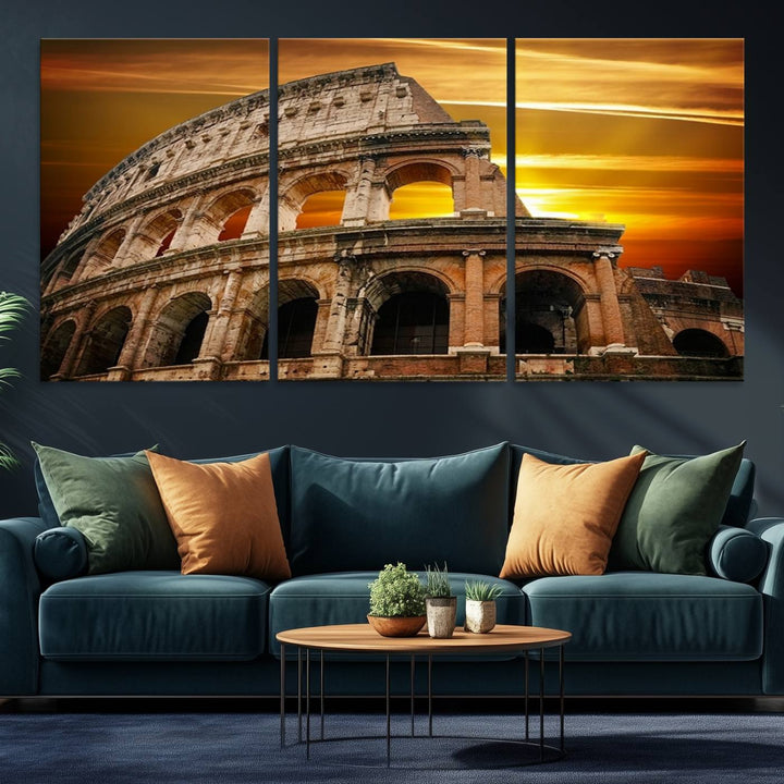 On the wall, theres a piece of art titled Colosseum with Yellow Sunset Behind, Italy.