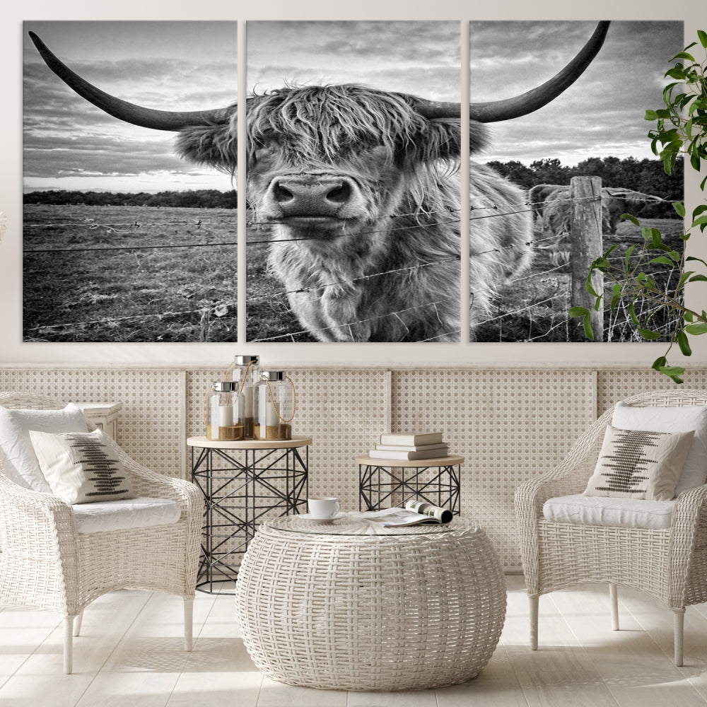 The "Scottish Highland Cow Canvas Wall Art Farmhouse Decor" adds a touch of rustic charm to your living room wall above the couch.