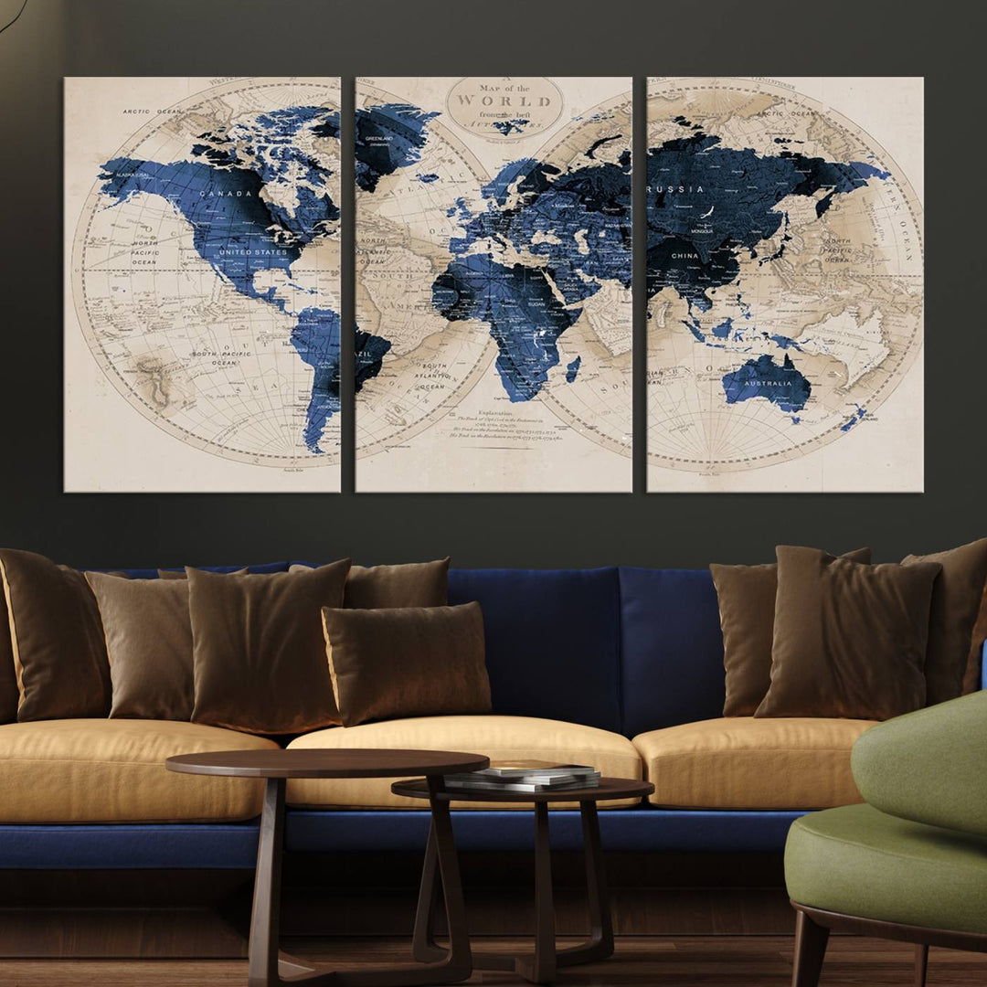 The Vintage Triptych Map Print is a grunge-stained blue and beige world map, perfect for enhancing wall decor.