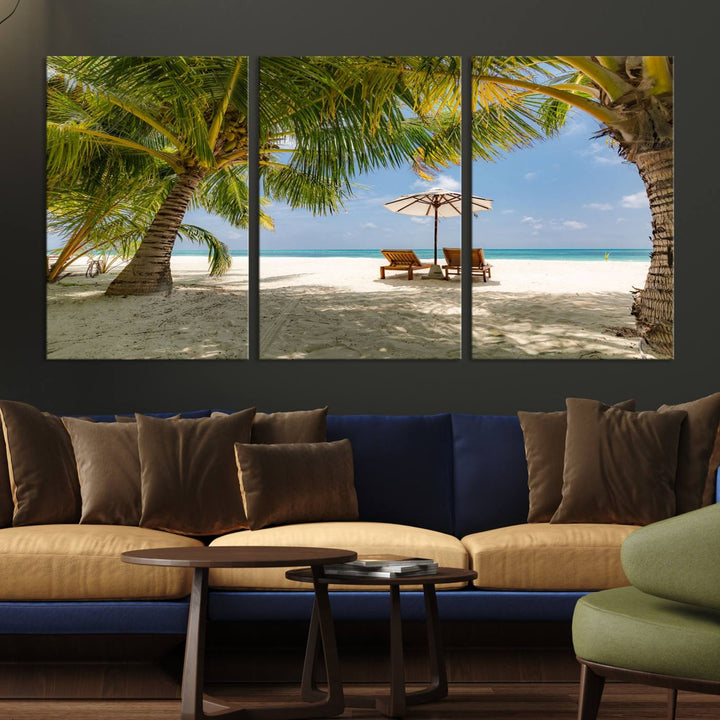 The canvas art print titled Lounge Chairs Palm Trees on Tropical Beach offers free shipping.