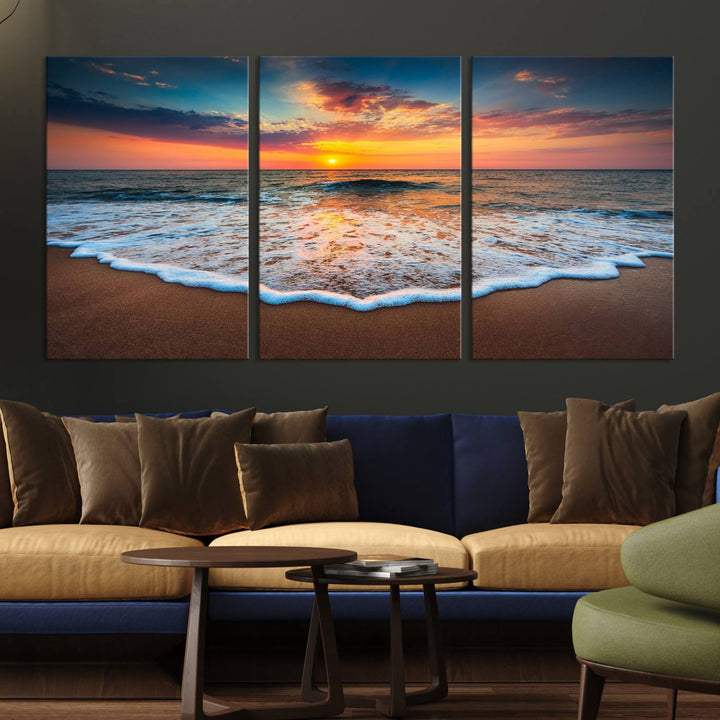 A Sunset with Calm Waves on the Beach Wall Art Canvas Print adorns the dining room.