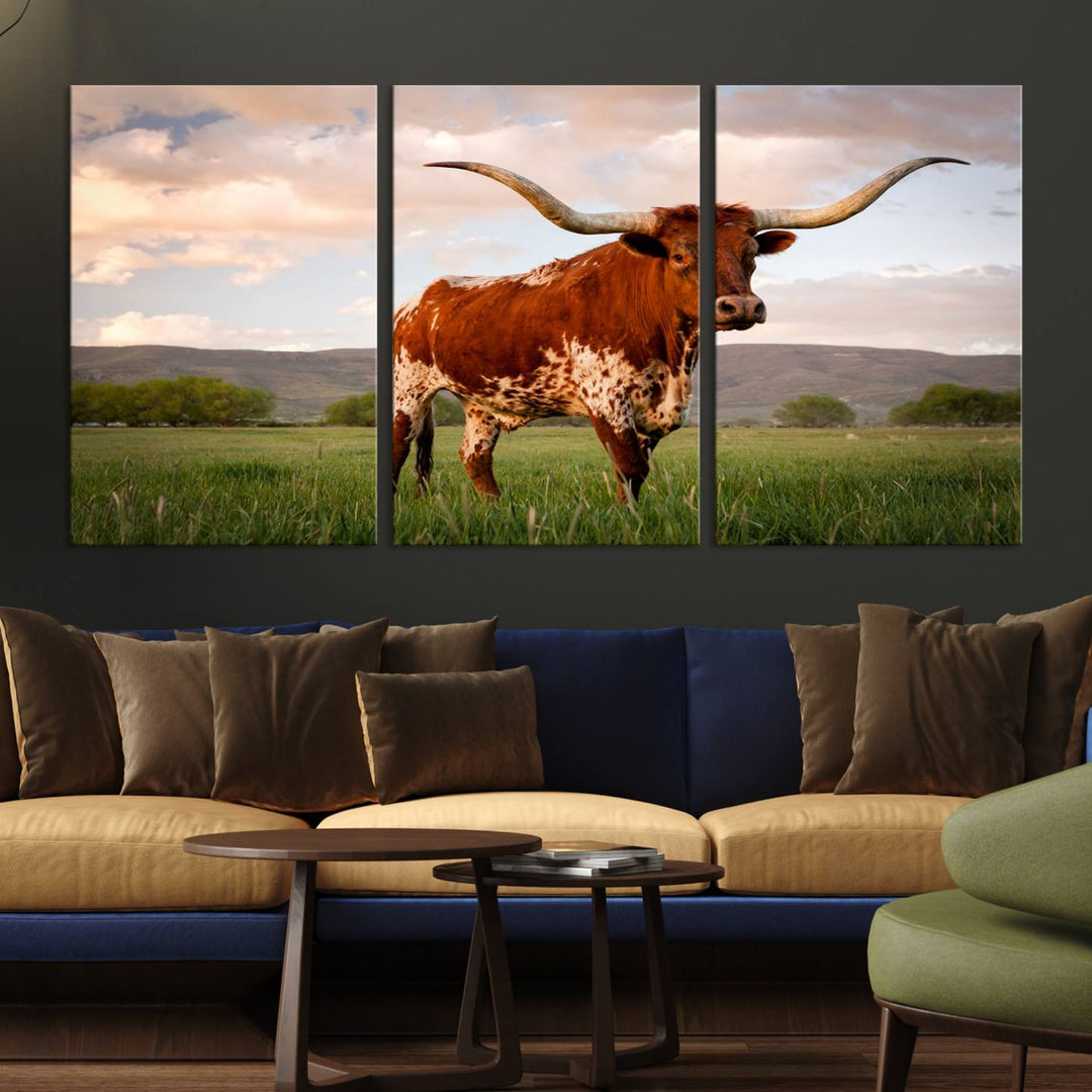 The Texas Cow Canvas Wall Art print captures a longhorn cow at sunset and is ready to hang.