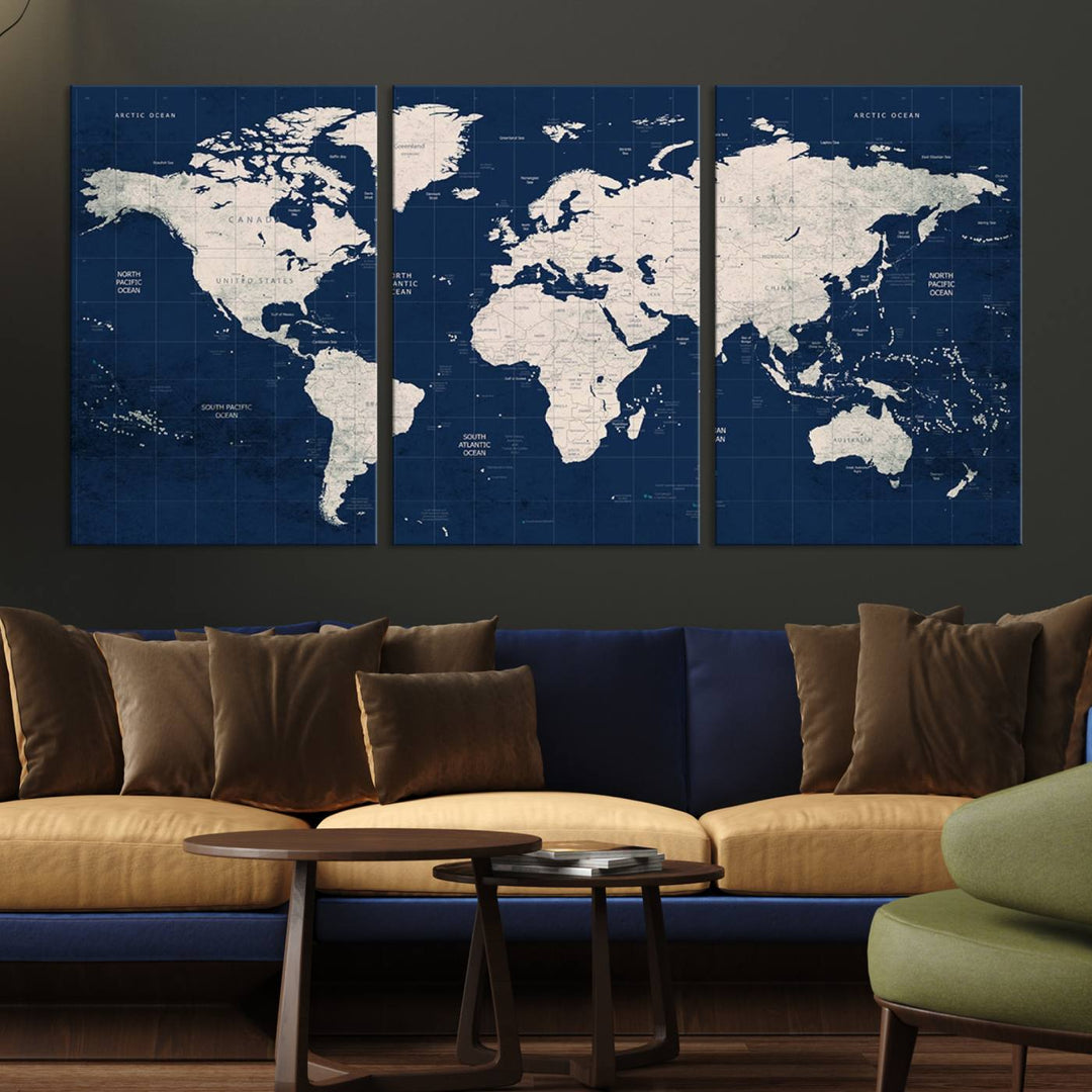 Large modern world map wall art canvas print in beige and navy; showcases a 3-panel vintage map design and is ready to hang.