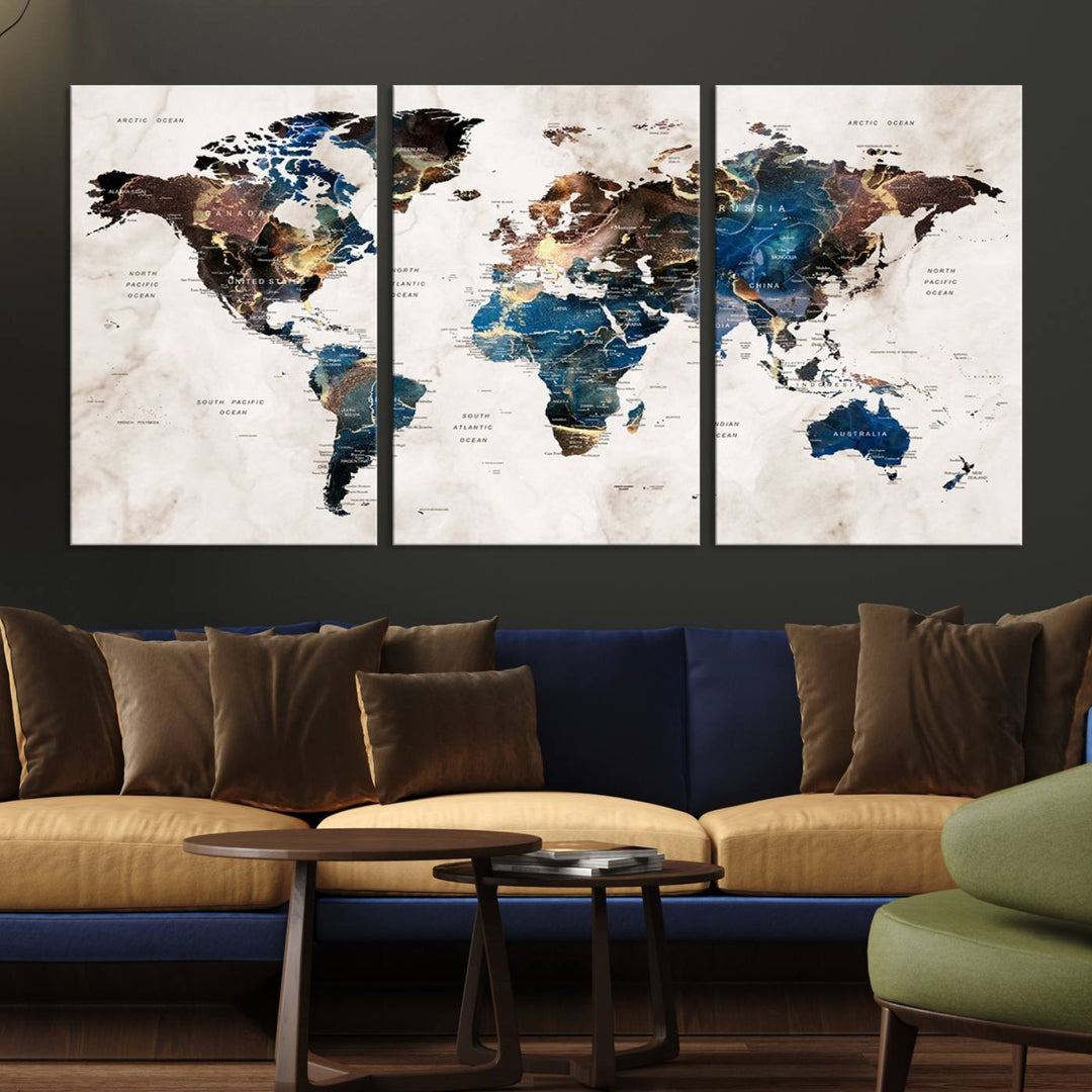 Abstract earth-toned 3-panel world map wall art featuring blues and browns, ready to hang; it showcases continents on modern canvas.