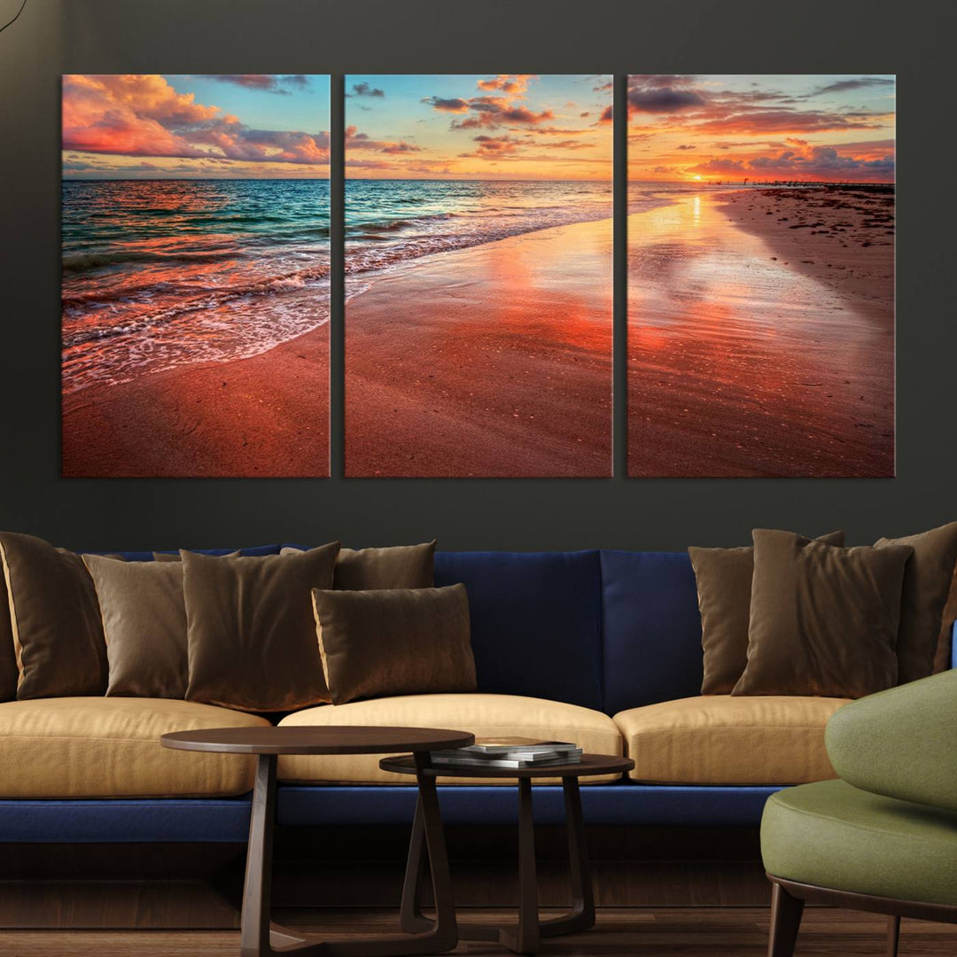 A Vibrant Sunset Beach Canvas Print with ocean waves and sandy shoreline enhances coastal-themed interiors.