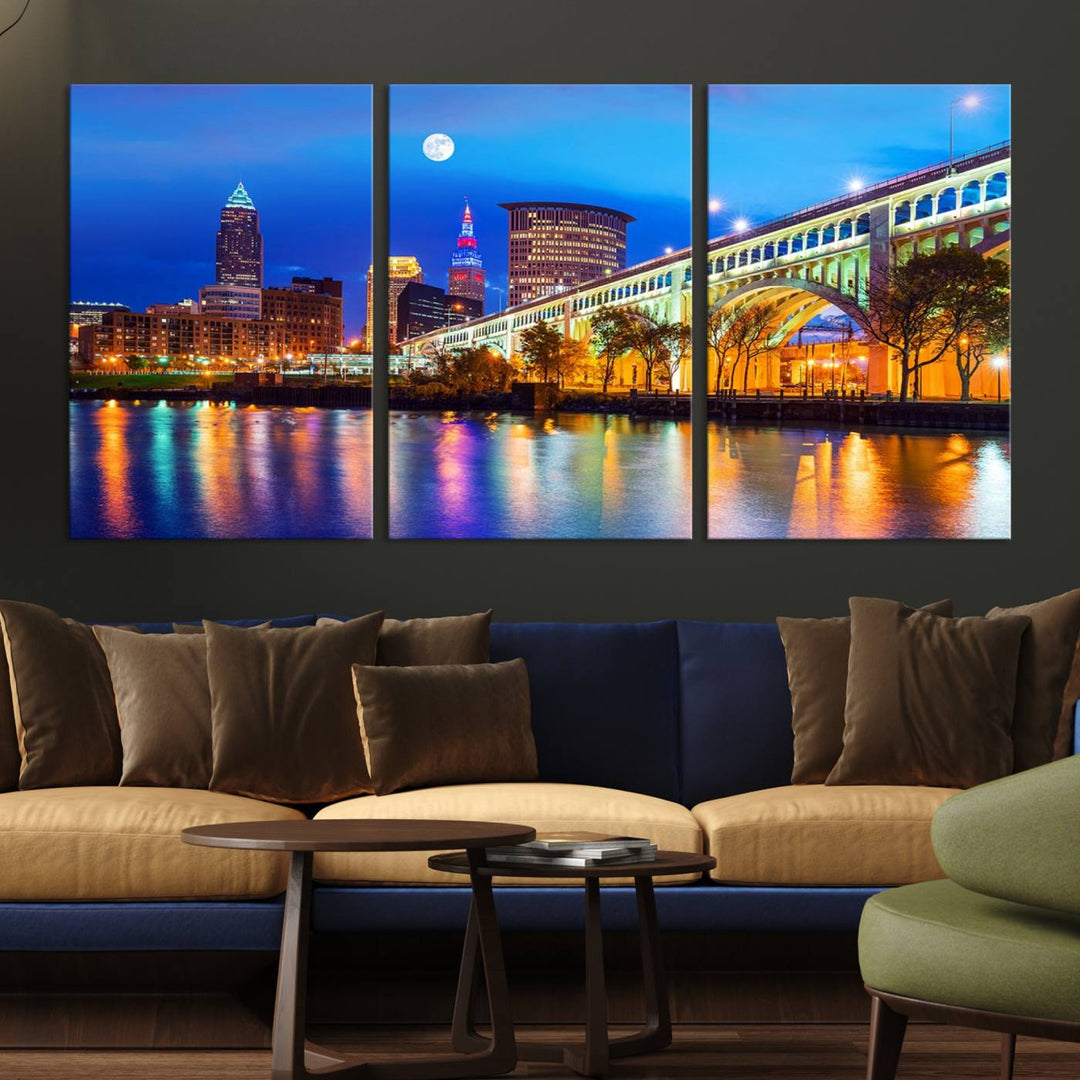 A Cleveland Night Skyline Wall Art on museum-quality canvas showcases a bridge and illuminated buildings.