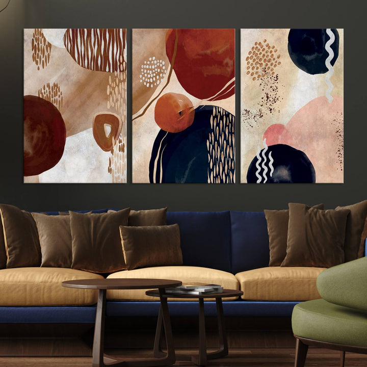 The Boho Neutral Canvas Print Set with earthy tones and circles hangs on the wall.