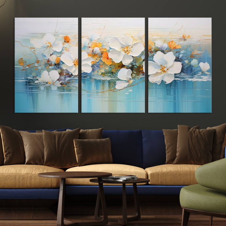 An Abstract Flower Wall Art Canvas Print in blue and orange hues.