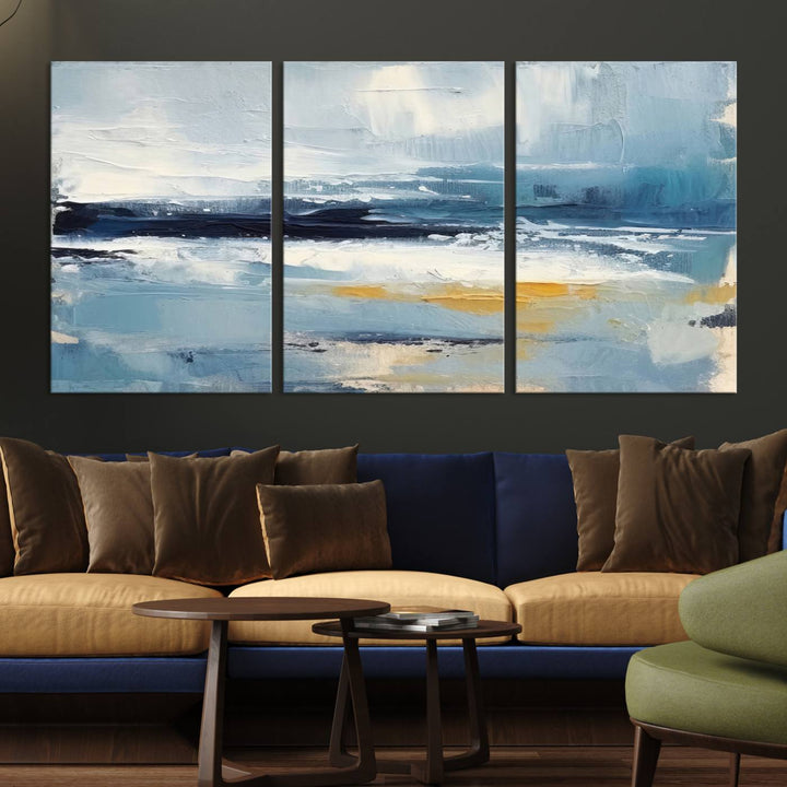 The Abstract Ocean Canvas Wall Art in coastal blue and gold enhances the modern kitchen.