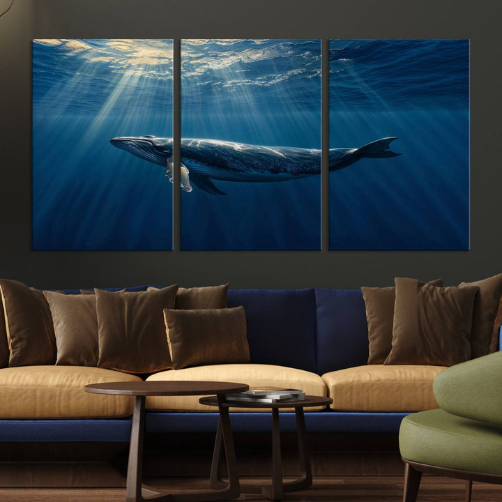 The Whale under Ocean wall art canvas print graces the white wall.