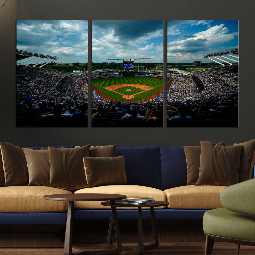 A 3-panel print of Kauffman Stadium, showcasing a crowded baseball field under cloudy skies.