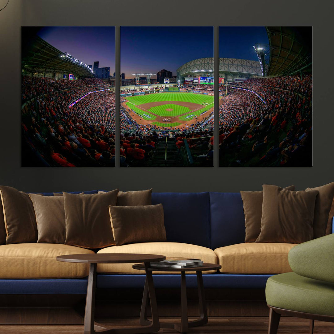 A canvas print of Houston Minute Maid Park at dusk is mounted on the wall.