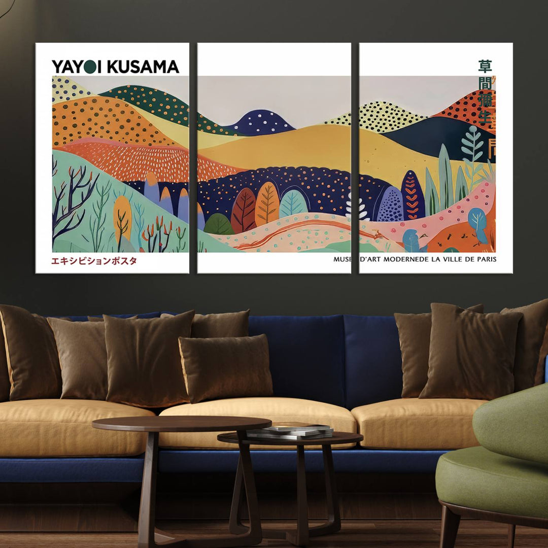 A triptych featuring the Framed Yayoi Kusama 1986 Wall Art Print hangs above. This Japanese Wabi Sabi inspired piece, rich in vibrant abstract landscapes, adds an elegant touch to any nature-inspired décor.