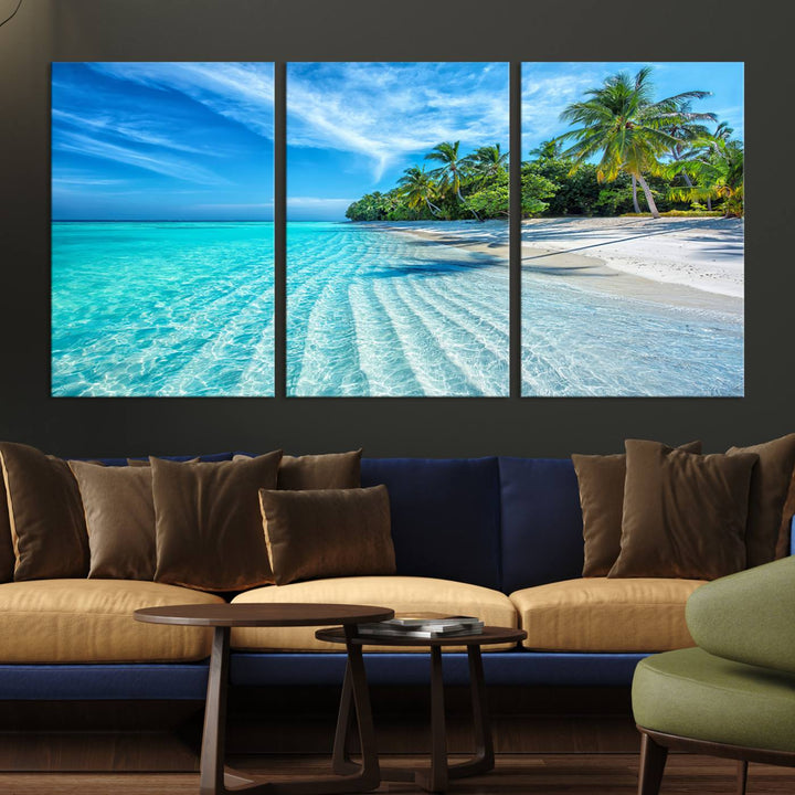 The Tropical Beach Wall Art Canvas Print showcases a serene ocean landscape with crystal clear turquoise water and palm trees, beautifully enhancing the coastal decor.