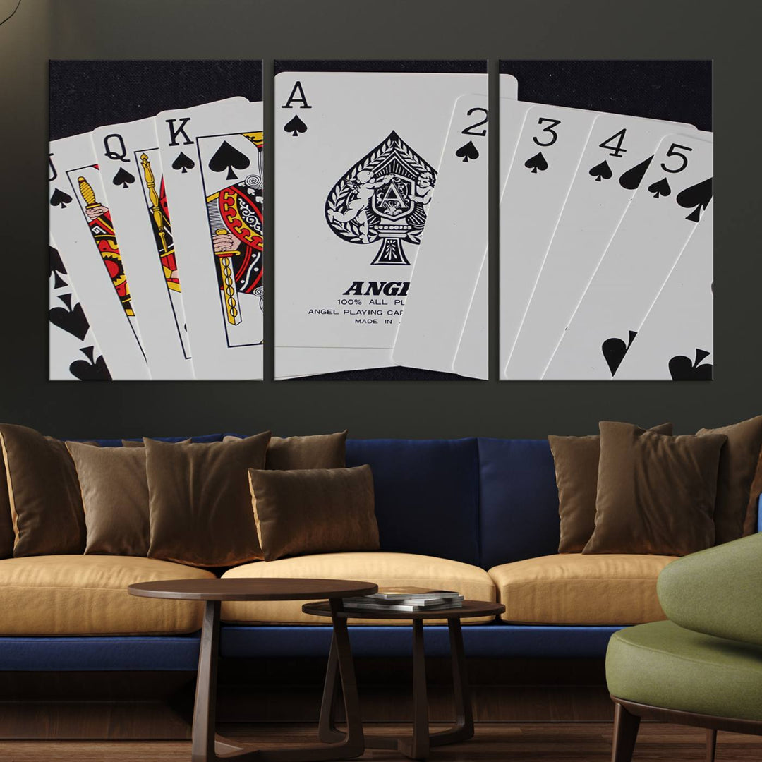 The Poker Wall Art - Playing Cards Canvas Wall Art Print features an Ace of Spades and Royal Flush design. This piece adds a classic charm to any space with its subtle emphasis on the Ace of Spades, making it perfect for game room decor.