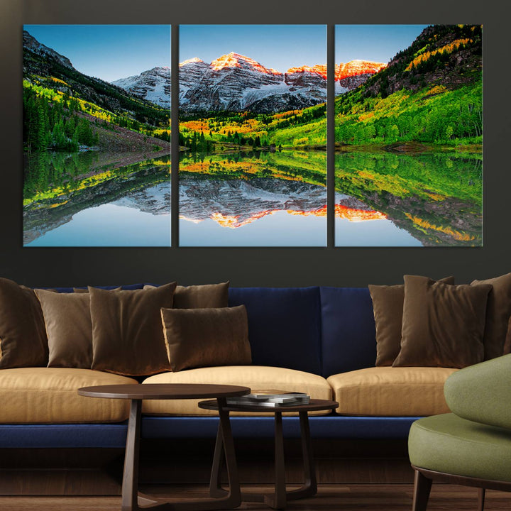 The Sunrise Maroon Bells Lake Wall Art Print beautifully captures North Maroon Peak mirrored in the tranquil lake, framed by lush greenery.