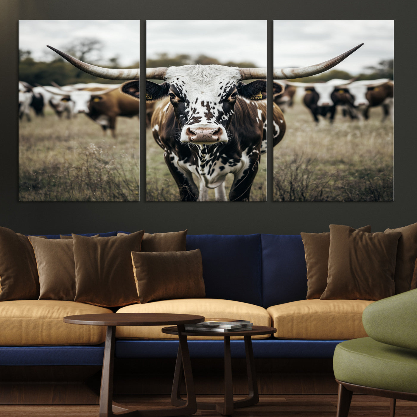 Canvas of a speckled Texas longhorn standing boldly in a field with a herd behind, perfect for rustic western or farmhouse wall decor.