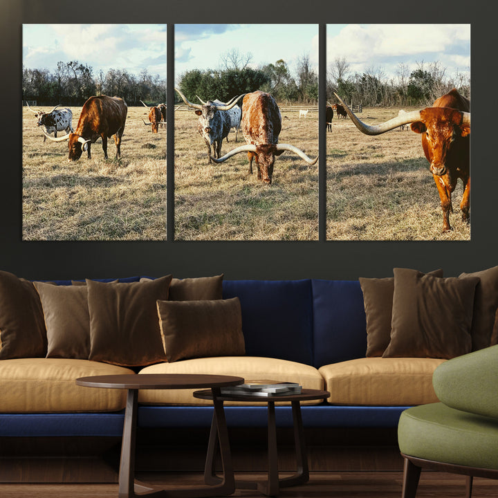 A herd of Texas Longhorn cattle grazing in an open field under a partly cloudy sky, capturing a rustic and Western ranch aesthetic.