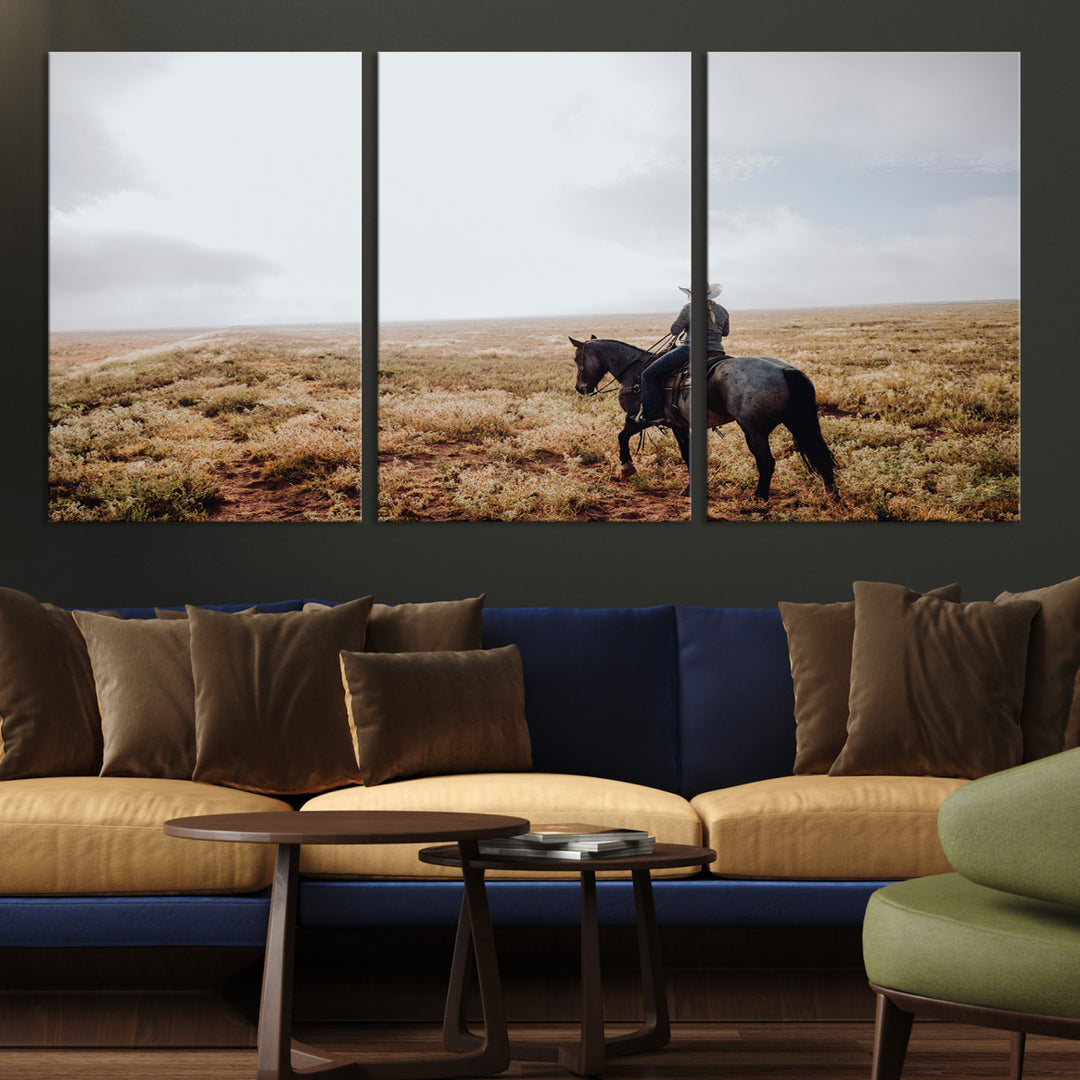 A lone cowboy riding horseback across an open prairie under a vast sky, capturing the rugged and timeless spirit of the Western frontier.
