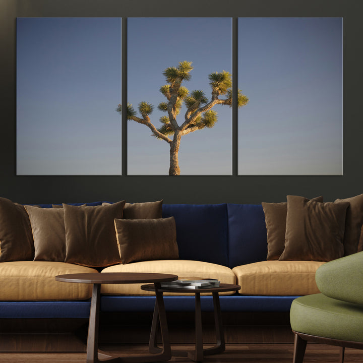 A lone Joshua Tree standing against a deep blue sky, capturing the serene and rugged beauty of the Southwestern desert landscape.