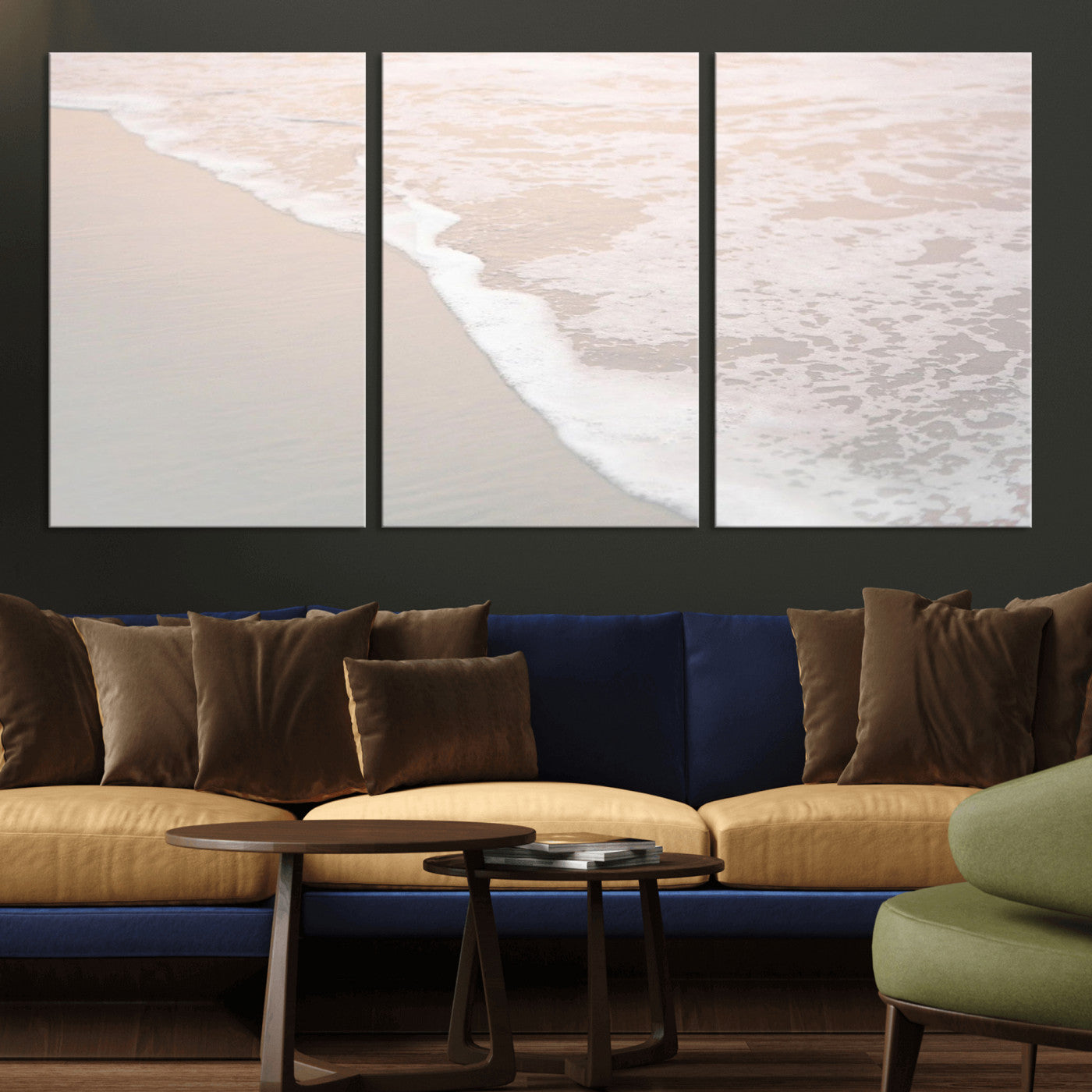 Close-up view of gentle ocean waves washing over smooth, wet sandy beach with soft foam along the shoreline.