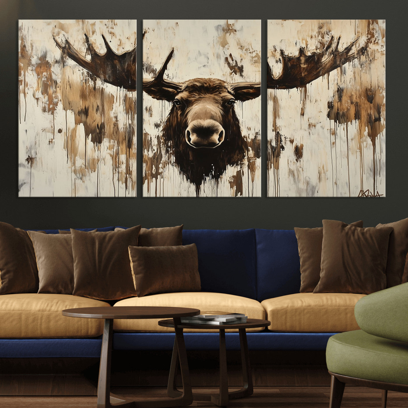 Expressive painting of a moose head with wide antlers in dark brown and beige tones, featuring paint drips and splatters on a light textured background, creating a striking rustic wall art canvas.