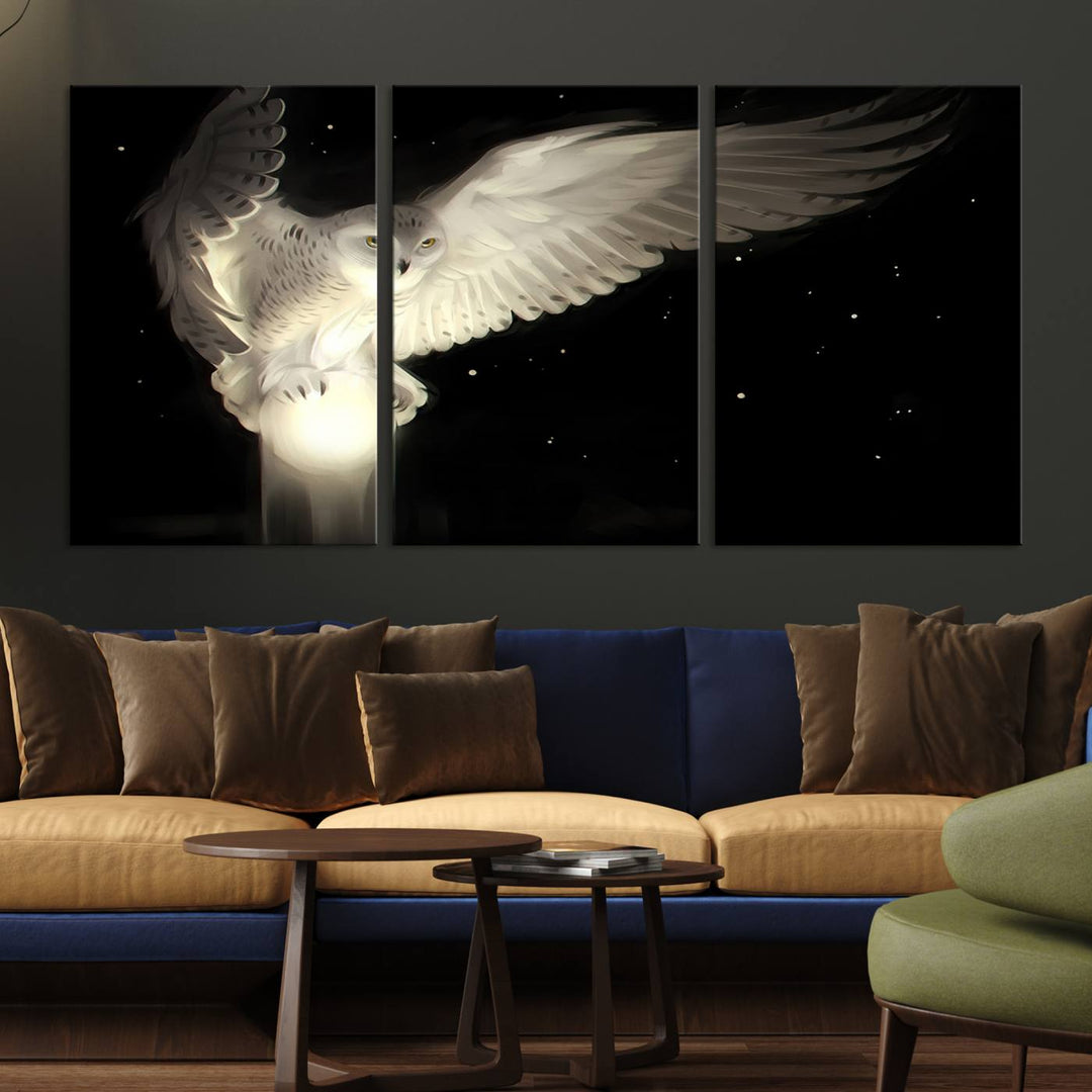 The Night Owl Art graces the wall with its depiction of a snowy owl on a glowing orb, perfect for modern decor.