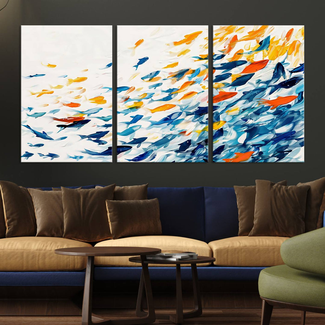 A colorful Abstract Fish Shoal Canvas Print hangs on the wall.