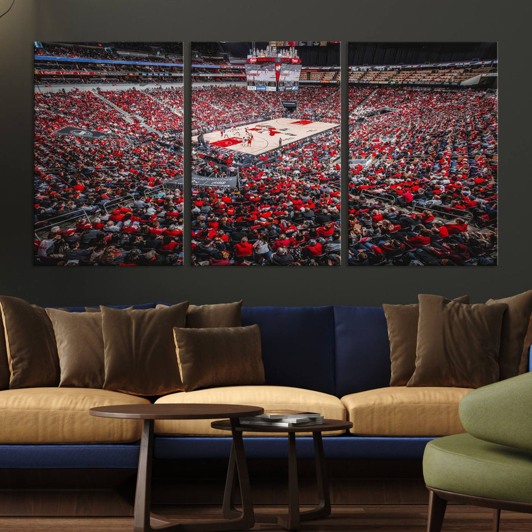 A painting of Louisville Cardinals fans in red at the KFC Yum Center Arena.