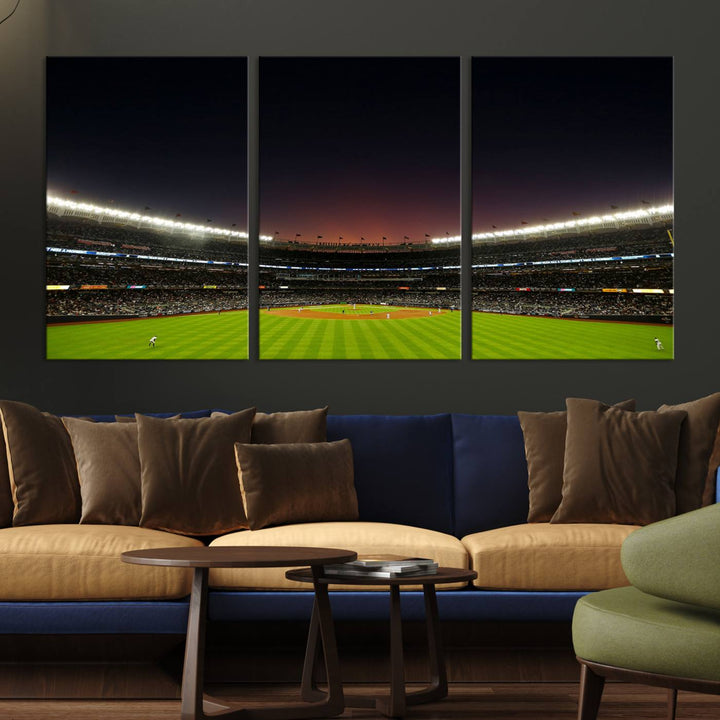 A night game at Yankee Stadium depicted on canvas beneath a sunset sky.