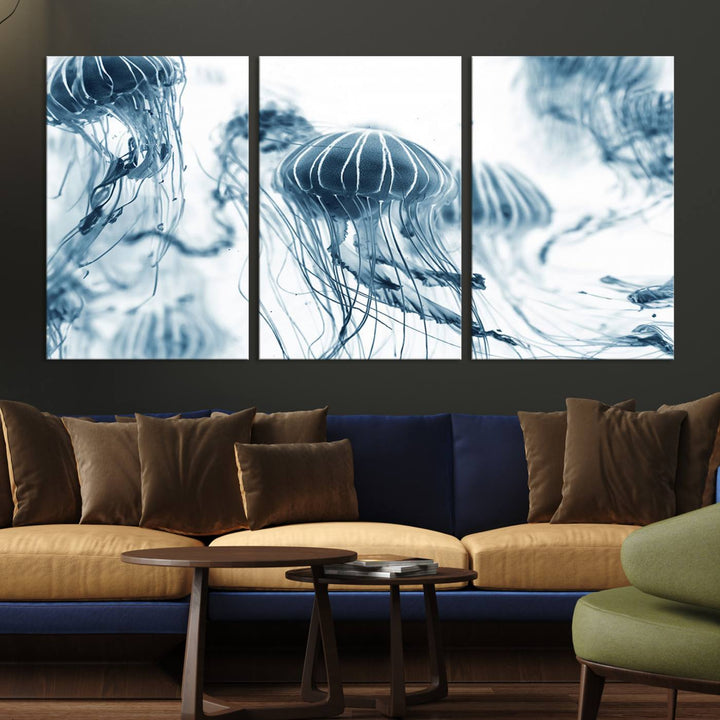 The "Abstract Jellyfish Wall Art Canvas Print" in high resolution is beautifully displayed as a triptych on a dark wall. Experience museum-quality canvas and enjoy free shipping with this stunning piece.