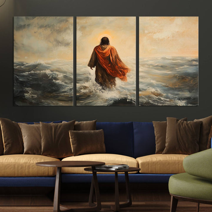 This triptych wall art, titled "Jesus Walking on Water," presents a figure in a red cloak crossing turbulent seas. It is perfect for those looking for religious home decor with a contemporary flair.