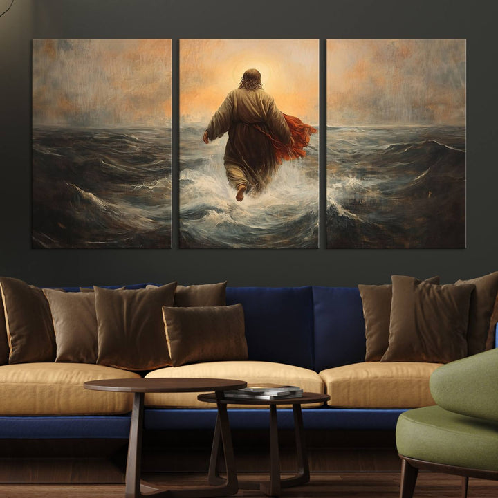 A modern living room is adorned with a triptych titled "Jesus Walking on Water, Christian Wall Art, Jesus Christ Walking on Oil Painting Style Print." The artwork, presented on museum-quality canvas, showcases vibrant colors and exquisite detail.