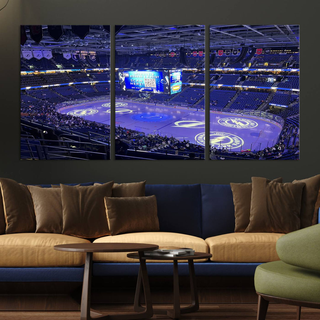 The wall art canvas print at Amalie Arena features team logos on ice, encapsulating the vibrant atmosphere of an NHL hockey stadium.